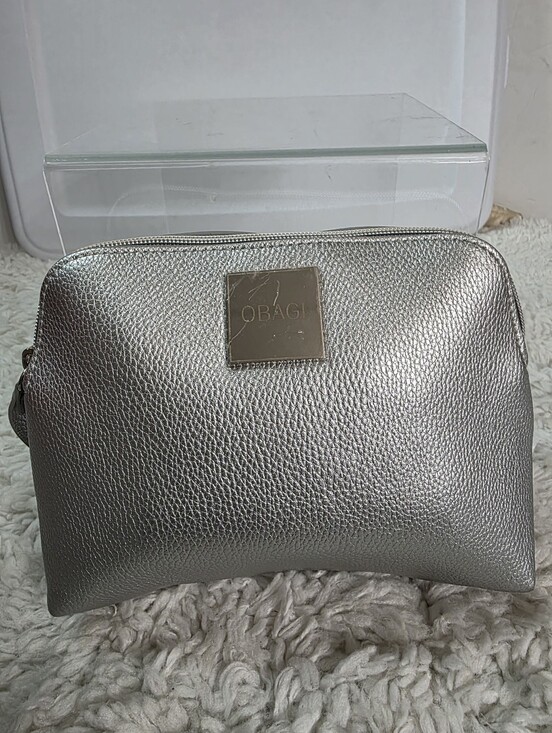 Obagi Handbags - Obagi Silver Metallic Cosmetic Case Bag